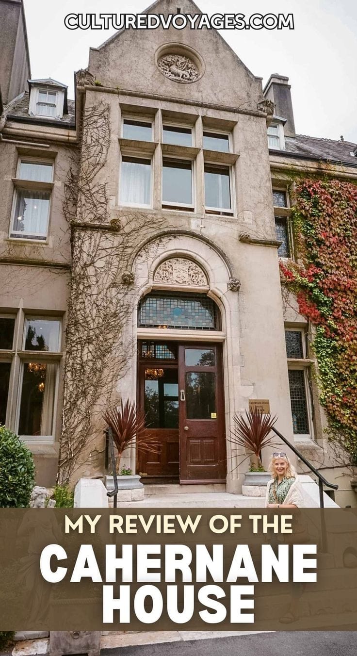 Pinterest pin featuring the historic entrance of cahernane house hotel in killarney, a grand ivy-clad manor house in County Kerry, Ireland. The text reads "My Review of the Cahernane House," with a traveller standing outside the hotel entrance. The pin promotes a detailed review of cahernane house hotel in killarney, covering the stay experience, location, and what guests can expect.