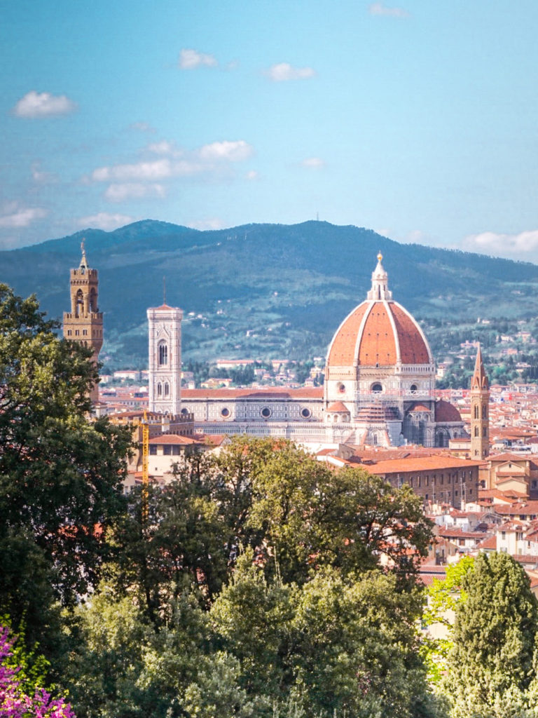 View of Florence Duomo across the spring flowers at bardini gardens