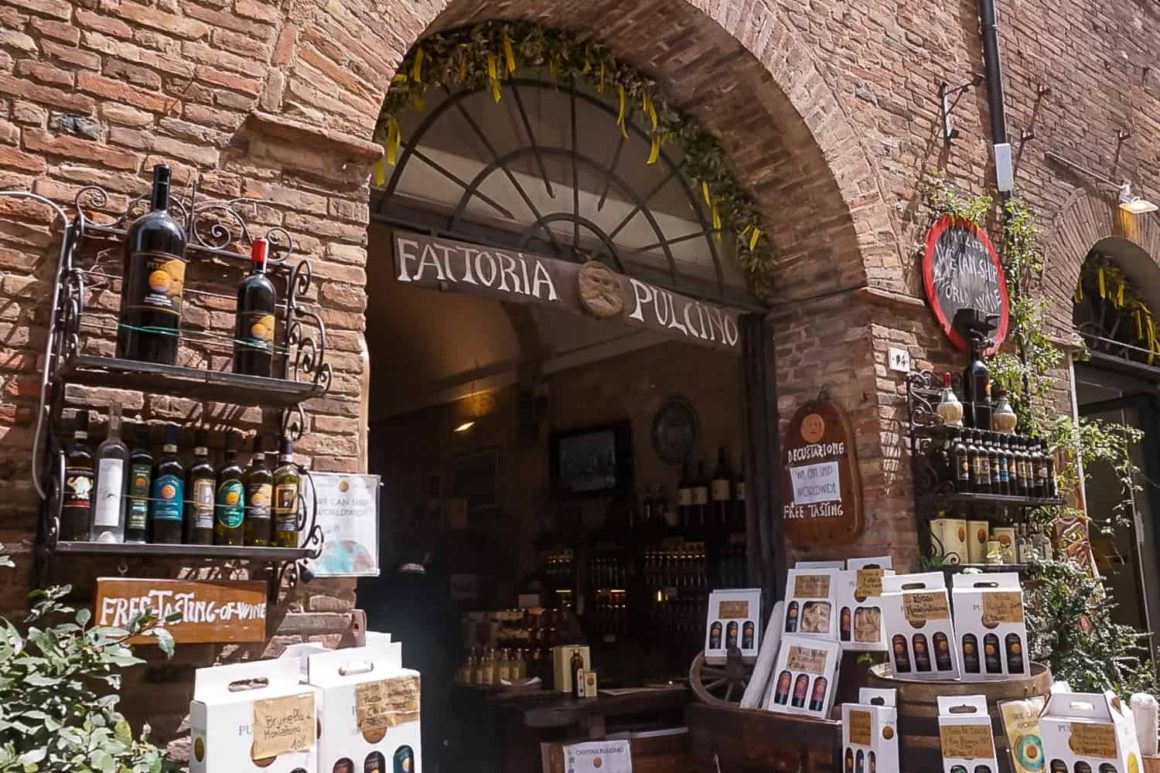 Traditional food and wine shop selling local olive oil and wine in a Tuscan town