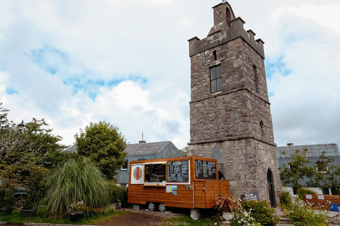 best food in connemara - wooden food truck in roundstone in front of bell tower