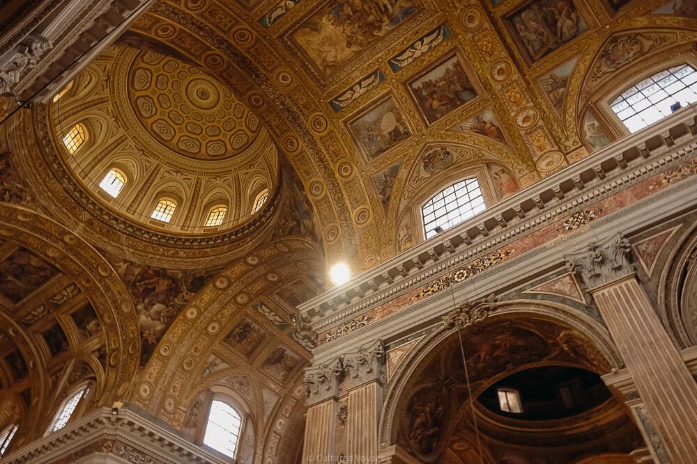 interiors of extremely ornate church in naples