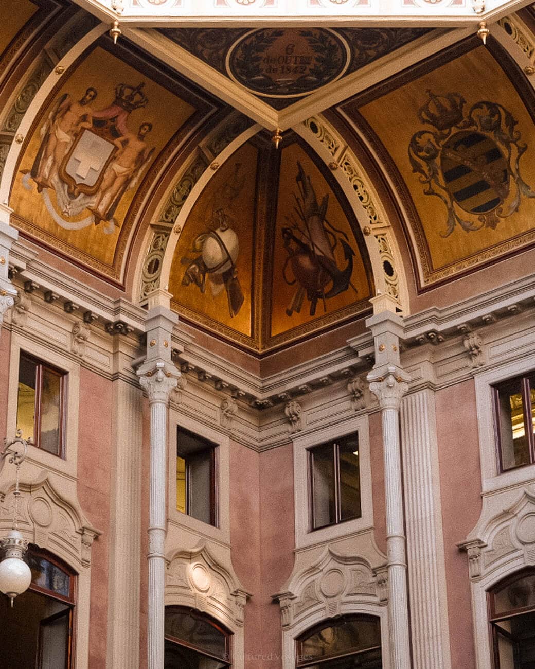 Corner wall of the Palacio da Bolsa with intricate carvings, frescoes, and paintings