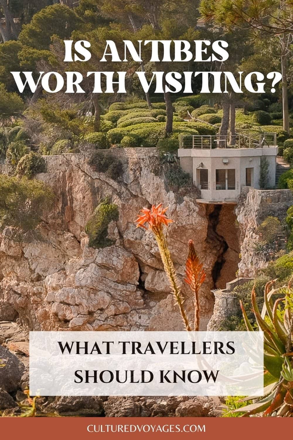 Is Antibes Worth Visiting pinterest pin cover, Rocky coastline in Antibes with Mediterranean vegetation, stone cliffs, and a modern villa perched above the sea surrounded by pine trees and landscaped gardens.