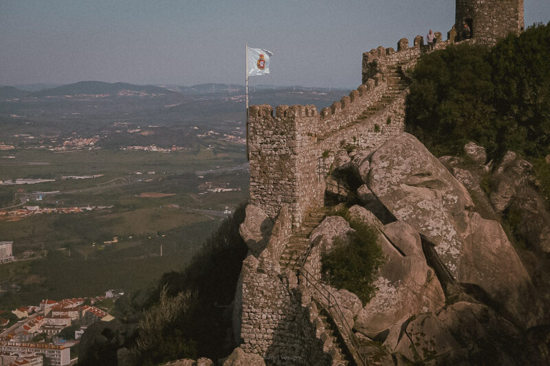 Stone battlements following the rocky hillside at the Moorish Castle in Sintra